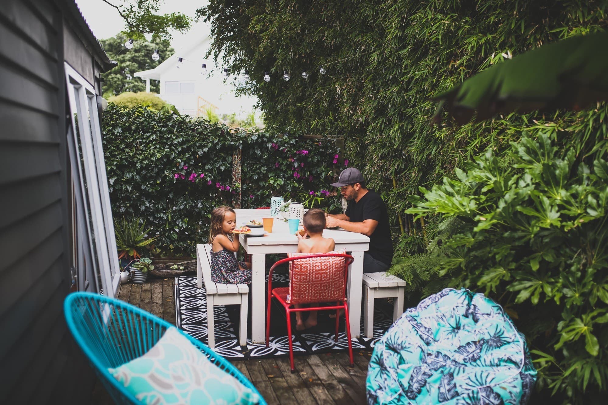 Family having dinner on outside deck